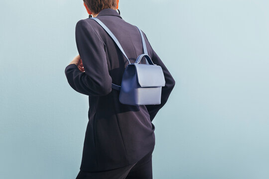 Fashionable Woman Wearing Stylish Blue Leather Backpack
