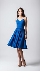 Naklejka premium woman in blue summer dress on white plain background pictorial model shoot portrait 3