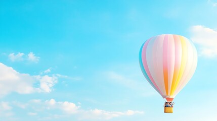 Fototapeta premium A vibrant hot air balloon floats gracefully in a clear blue sky, surrounded by fluffy clouds, evoking feelings of freedom and adventure.