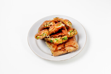 Martabak Telor or Martabak Telur. Savory pan-fried pastry stuffed with egg, meat and spices. isolated on a white background, good for commercial or article