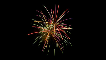 Fireworks Confetti. Beautiful close-up color photo of multi colored fireworks exploding against a black night sky. Copy space.