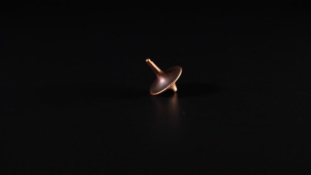 Spinning Top in Motion