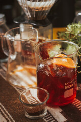 Male barista making coffee with manual dripper grinding beans. Coffee concept.