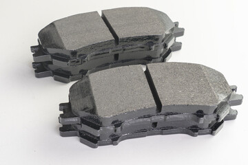 Front and Rear New Brake Pads For Modern Car.