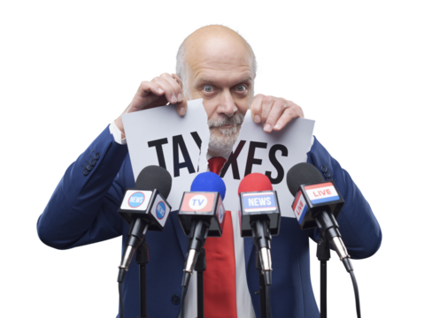 Politician tearing a sign with taxes concept
