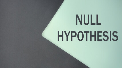NULL HYPOTHESIS - words on a gray-mint background close-up
