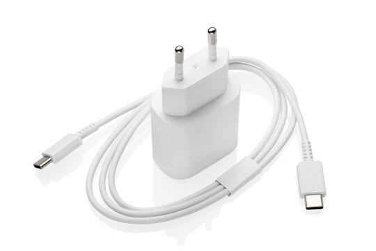 Charging unit with a wire for various gadgets isolated on a white background