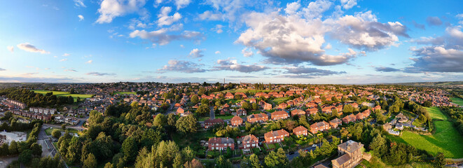 Panorama aerial drone photography of a summer evening in a typical urban town scene in the town of...