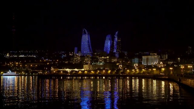 Night view of Baku featuring the iconic Flame Towers with animated exterior, Azerbaijan
