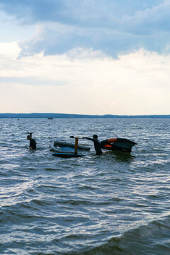 Wingfoil rider riding in the lake.