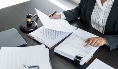 Lawyer businessman working with lawbook in office or courtroom Legal counsel with gavel and legal...