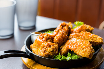 Deep fried chicken wing in restaurant
