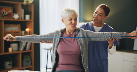 Women, physiotherapist and senior patient with resistance band for rehabilitation, support and healthcare. People, retirement home and happy for stretching, exercise and recovery with elastic rope