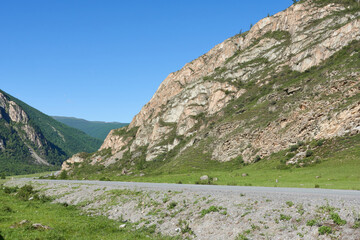 Mountain landscape with a serpentine road in the Altai Republic