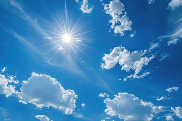 A picture of a bright and clear blue sky with sunshine, perfect for use as background or illustration