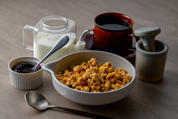 Milk and granola.
Breakfast image.
