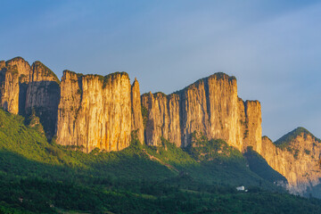 Landscape with steep limestone karst cliffss at sunset, Enshi Grand Canyon National Park, Hubei province China
