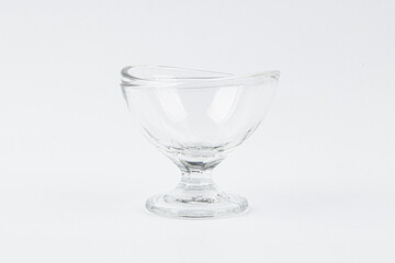 a clear glass ball against a white background