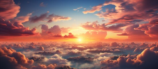 Beautiful aerial view above clouds at sunset. Heavenly Sunset Cloudscape