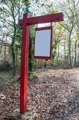 blank noticeboard  hanged at park in autumn