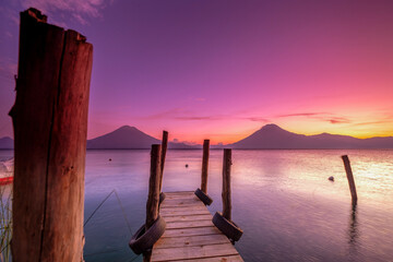 Traditional moorings and volcanoes of Atitlan 3537 m. and San Pedro 3020 m. Lake Atitlan, Solol&aacute; Department, Republic of Guatemala, Central America
