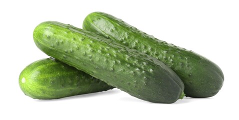 Three fresh green cucumbers isolated on white