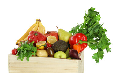 Many different fruits and vegetables in wooden crate isolated on white