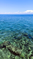 Adriatic sea surface with pebbles and stones 