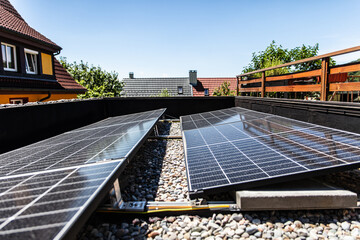 pv panels on a flat roof with pebbles