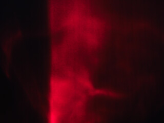 Red reflection in the dark for mysterious abstract background.        
