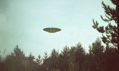 Wide Shot of UFO Hovering Above Pine Forest on a Cloudy Day