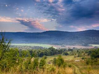 Wonderful landscape view on the Carpathian Mountains during the sunset in the summer season 