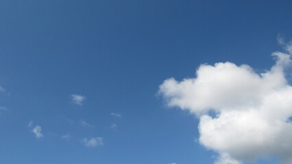 Blue sky background. sky and white clouds. warm weather.