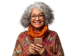 A joyful elderly woman with curly gray hair smiles warmly while holding her smartphone in her hands.