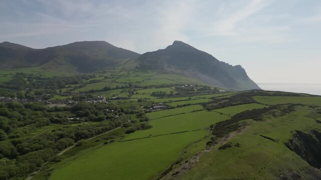 Aerial video over the coastline in Trefor Bay United Kingdom