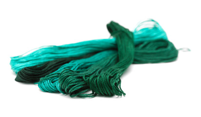 Cotton embroidery thread hanks in different colors, isolated on white background
