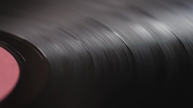 close up vinyl record spinning , retro vinyl record in turntable macro