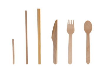 Eco-friendly wooden and bamboo cutlery set on a transparent background- Recycle concept