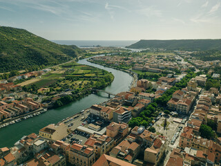 Fototapeta premium Aerial view of Bosa, a small colourful town near Oristano, Sardinia island, Italy