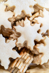 Baking Snowflake-Shaped Sugar Cookies for Homemade Christmas Gifts