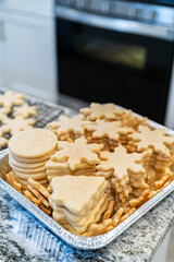 Baking Snowflake-Shaped Sugar Cookies for Homemade Christmas Gifts