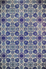 Traditional Turkish ceramic tiles, closeup photo of decorative, vintage, blue, cyan, historic tiles on the wall in Türkiye (Turkey)