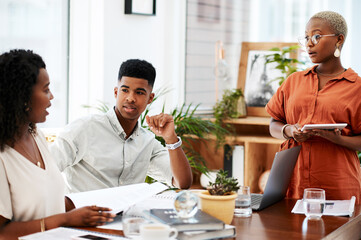 Office, woman and couple with documents in discussion for investment budget, information and advice. Financial advisor, people and portfolio with meeting at desk for debt, review and risk assessment