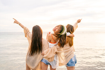  Group of Young Asian woman enjoy and fun outdoor lifestyle travel nature ocean on summer beach...