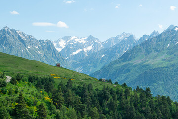 Obraz premium Magnificent mountains to trek in Mestia. Blooming mountain views in snowy weather in Mestia Georgia. Magnificent Mestia mountain views. Koruldi Lake trekking route.