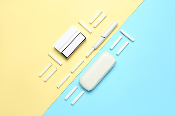 Composition with modern electronic cigar and sticks on colorful background