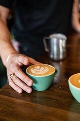 Making a beautiful cappuccino with latte art
