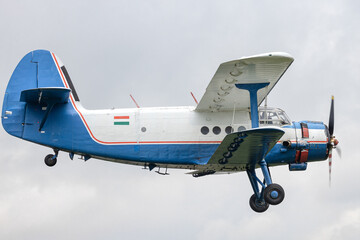 double wing old plane flying