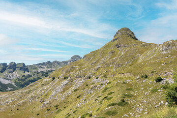 Obraz premium Majestic summer day in the Durmitor National park. Village Zabljak, Montenegro, Balkans, Europe. Scenic image of popular travel destination. Discover the beauty of earth. Hiking nature destination