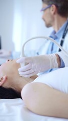 Fototapeta premium Doctor man wearing white protective gloves is using ultrasound machine to examine neck of female patient in hospital. Medicine, thyroid gland health